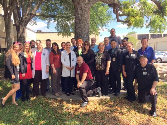 Some of the members of Oak Hill Hospital’s Great Hernando Weight Loss Challenge teams show off their weight loss to the camera.