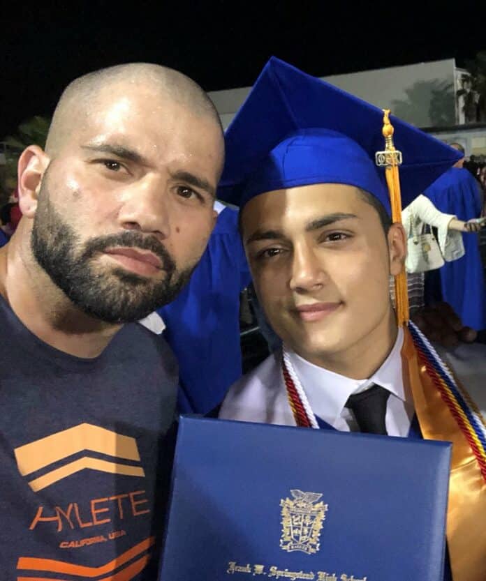 Chelo Alonzo and son, Xzavier, at graduation ceremony. Photo by Cristina Alonzo