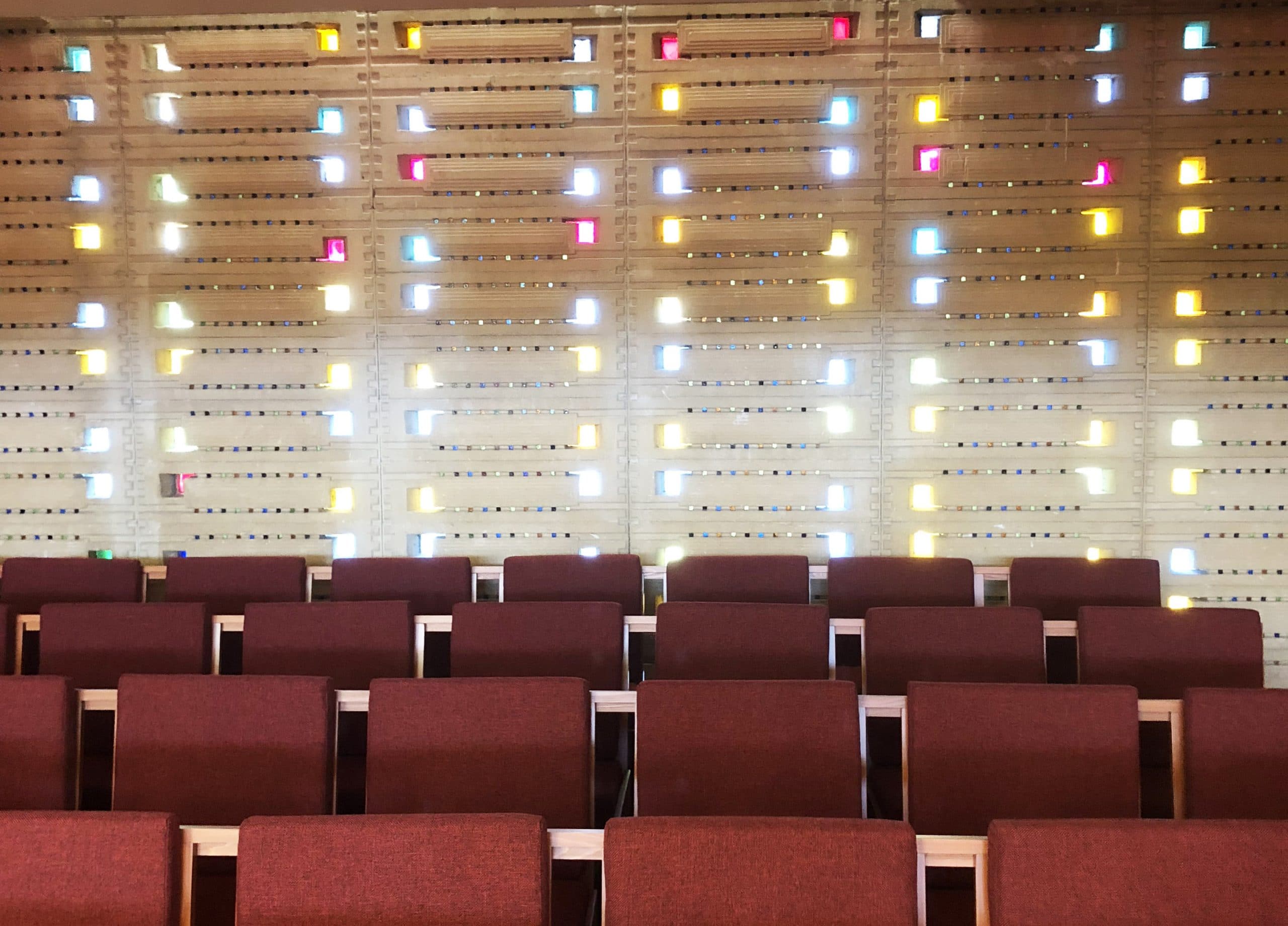 Light streams into the Annie Pfeiffer Chapel through unique block and stained glass work