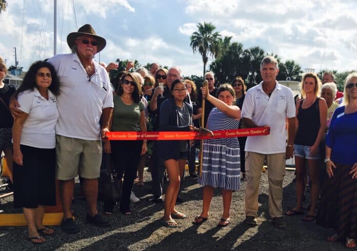 Marina Rose Rossi and Janelle Rybka cut the ribbon