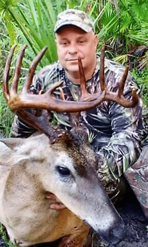 Isreal Illedias with a monster, chocolate racked buck taken opening morning of Florida’s Zone A.
