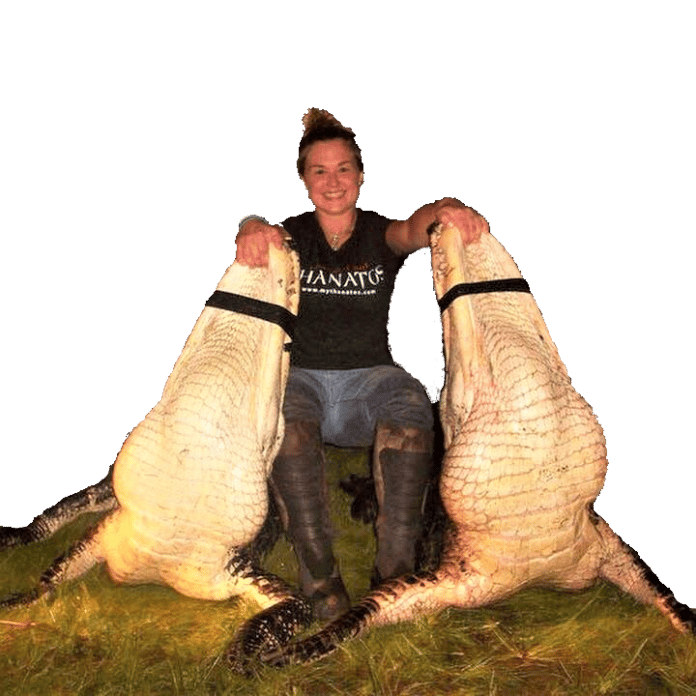 Meghan Bailes with a pair of monster bull ‘gators.