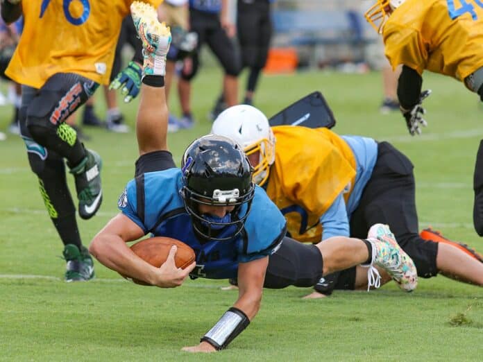  Lions Evan Klukowski gets some extra yardage after breaking through Faith Christian Academy's defense.