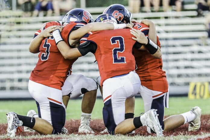 Springstead prayer before taking on New Port Richey Mitchell Friday Night.