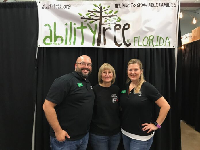 From left to right: Wayne Cordova, Frances Kirkpatrick of Sonny's BBQ and Tina Cordova