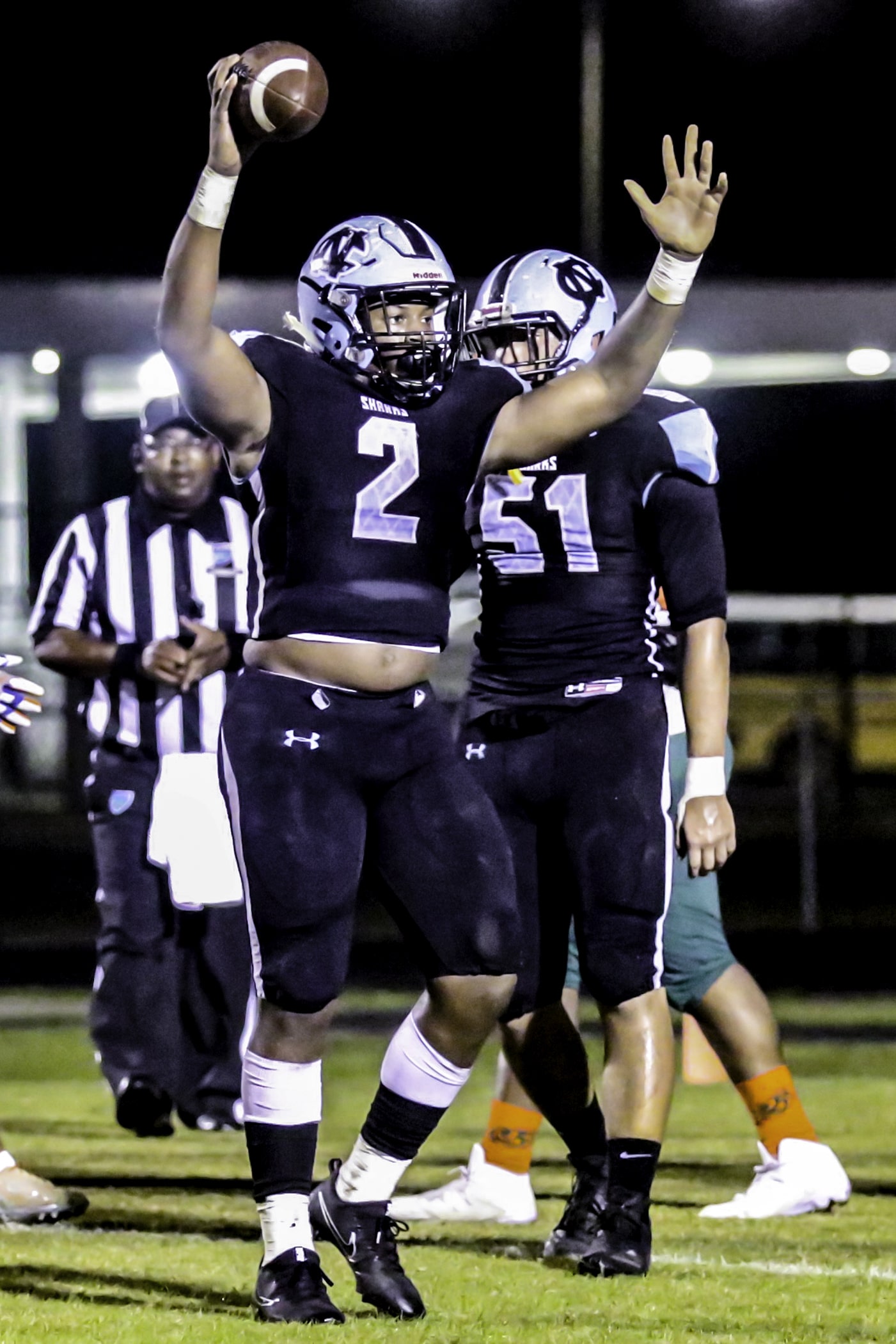 Mike Weston on the field in the region playoff against Eastside.