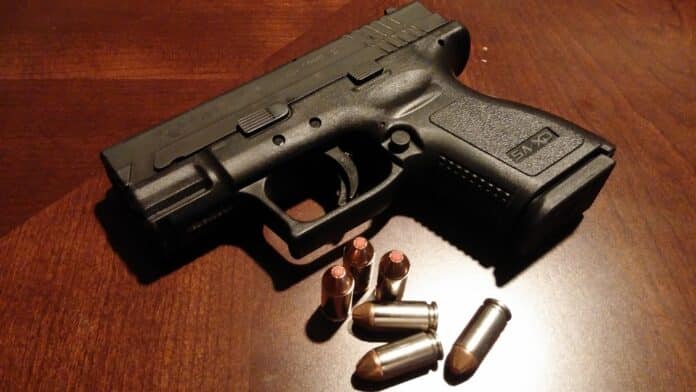 Image of handgun and ammunition