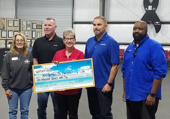 Spherion Staffing as they present their check donation or $1,000 to K9 Partners for Patriots.  L-R: Mary Peter, Michael Spaulding, Teri Nichols, Paul Spaulding, Marty Monegro