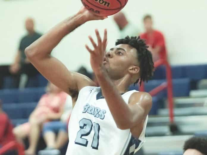 Bears Theo Escarment attempts to put two points on the board against Hudson during the Glory Days Preseason Basketball Classic at Springstead High School.