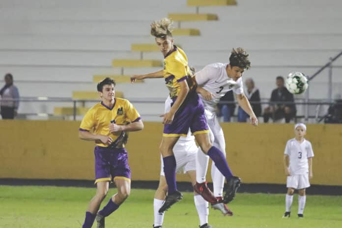 Hernando Sophomore Jacob Kelly collides with Seffner’s Senior Christian Helms to controls a header.