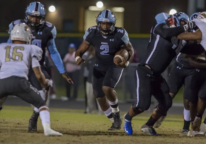 Nature Coast Tech, Mike Weston rushes against North Marion in the home play-off game loss Friday night in Brooksville. Photo by JOE DiCRISTOFALO