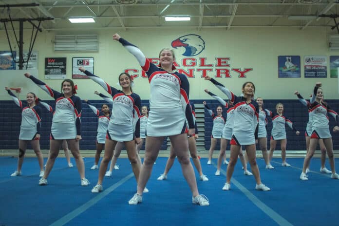 Competitive cheer is more than just sideline cheerleading, and there are higher demands in dynamics and ingenuity.