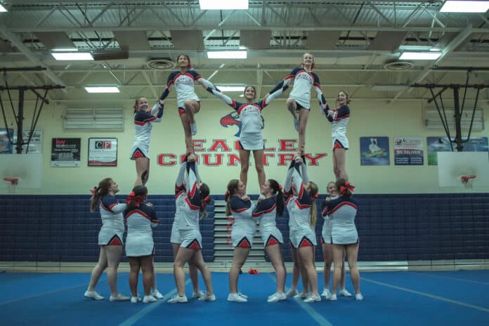 The Springstead Cheerleading squad on the mat during the Springstead Cheer Showcase competition on Dec. 21, 2018