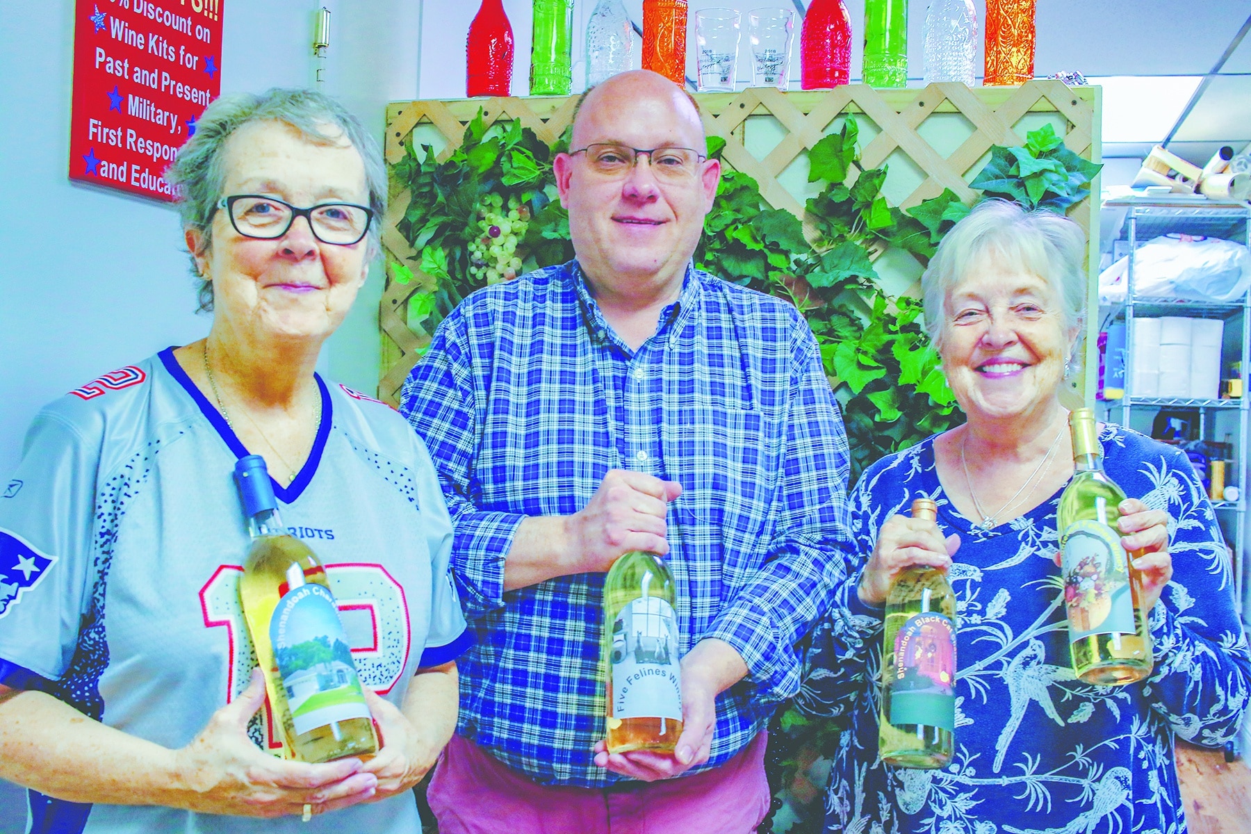 Once Upon a Time customers, Joanne Stuart, Jonathan Lamson and Linda LeClaire-LeBlanc created their wine for Christmas gifts.