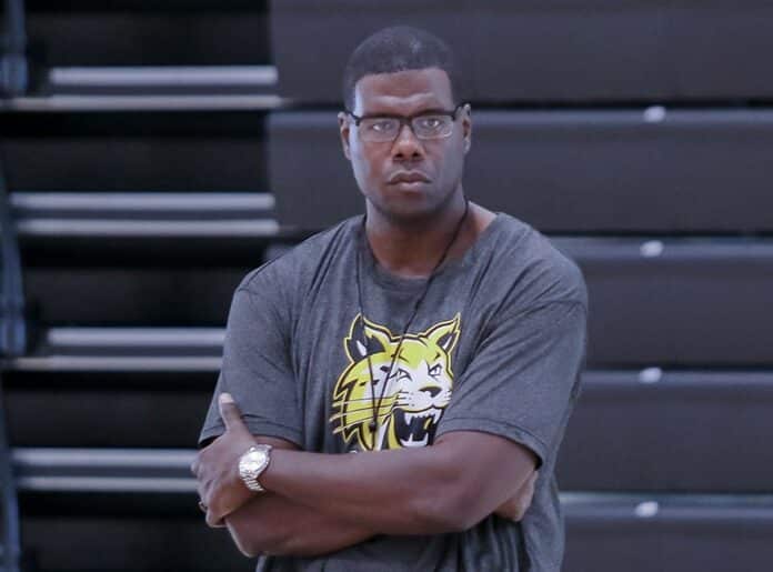  Head Basketball Coach Micheal Jones observes athletes performance and skills for specific drills during the Seniors Basketball Showcase on January 5th at the West Campus in New Port Richey.