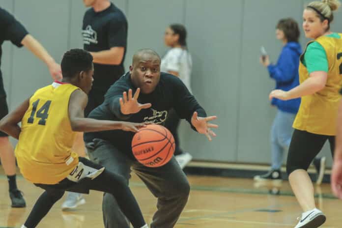  Deputy Leonard Gray attempting to steal the ball from Tavionn Williams