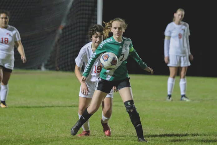  Weeki Wachee Junior Reilley Bain gains possession of the ball during a Monday night game against Springstead. Hornets reigned on their home field against the Eagles 3-0