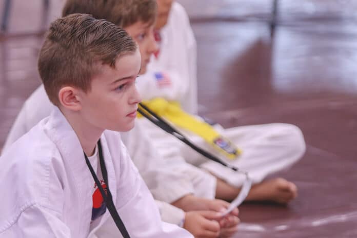 Patrick Bingham 8-9-year-old yellow belt division representing Taekwondo America.