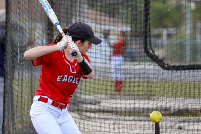 Springstead Senior Emily Kowicz warms up batting before the game.