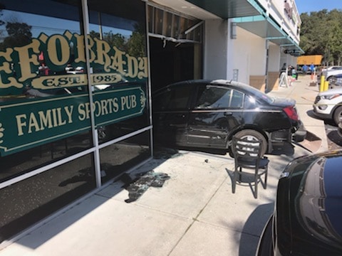 2007 Saturn collided with 5 adult patrons inside Beef O' Brady's