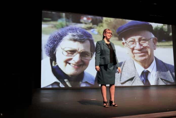 Author Roslyn Franken with photo of her parents Sonja and John Franken 