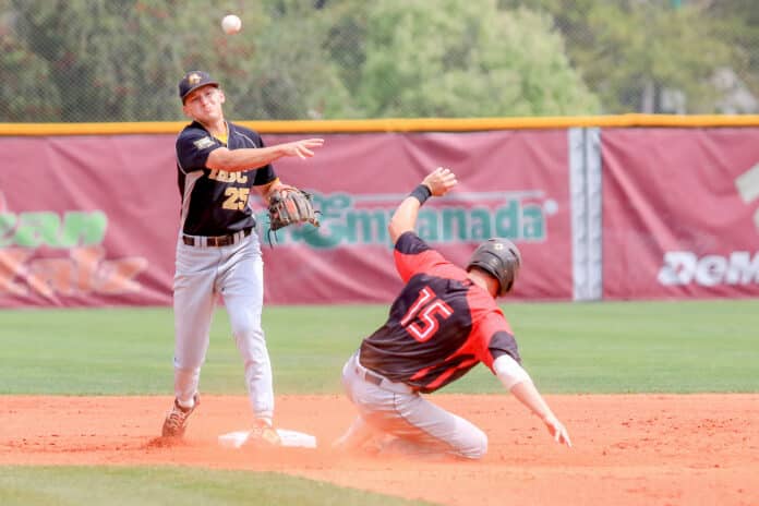 PHSC vs. U of Tampa JV 2: PHSC Freshman Michael Haydak outs Spartans Thomas Bencivenga in an attempt for a double play.