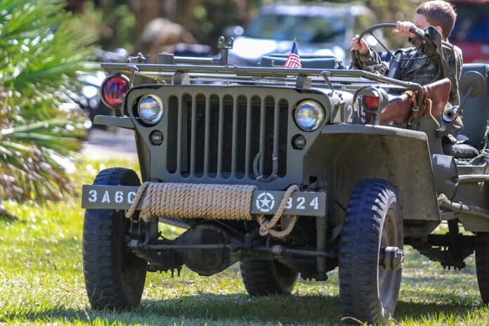  A young visitor sits in a restored MP Jeep during the WWII Event at Dade Battlefield State Park in Bushnell.