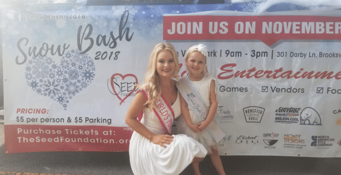 SEED foundation float in the Veterans Day parade - Kennedy Campbell Worlds and Brielle Skye