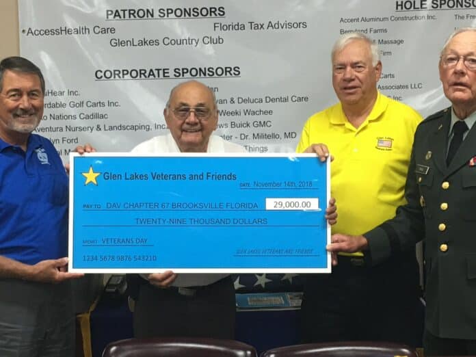 L-R Gary Grey (treasure DAV), Steve Greco (commander DAV), Dennis Blum, George Friel (Glen Lakes Veterans & Friends) 