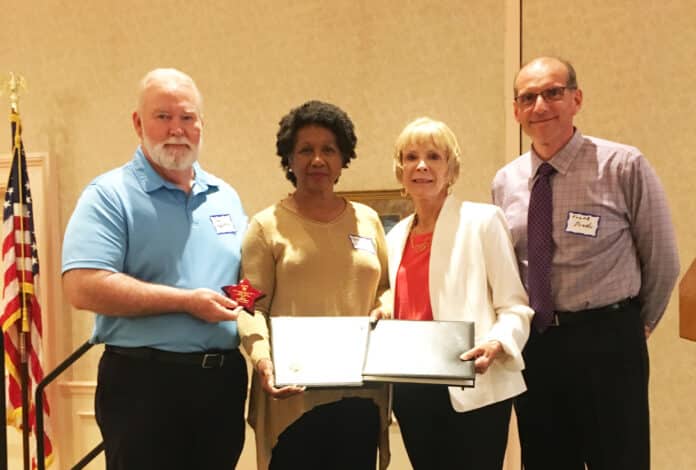 From left to right is Paul Crawford, north regional director – Valerie Homer Faggart, Marsha Hilty circuit director, Frank Prado chief operating officer for the state wide guardian ad litem program