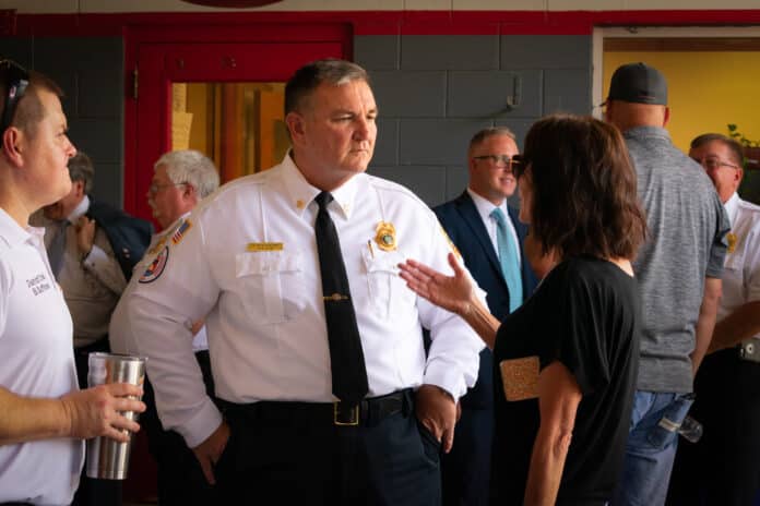 Chief Snowberger speaking with Lori Eppley