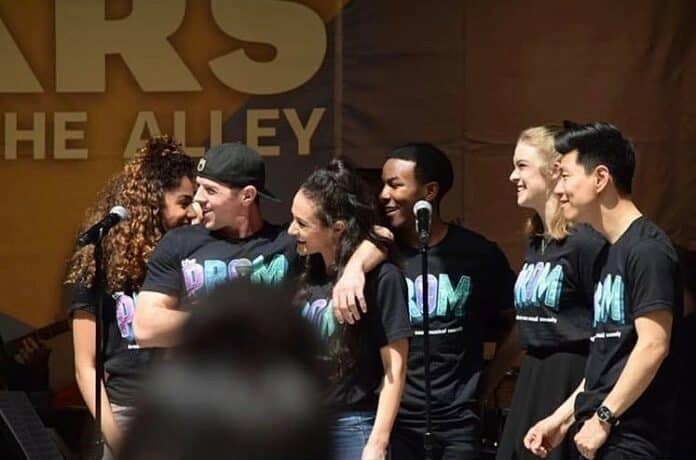 Teddy Toye with Prom cast members