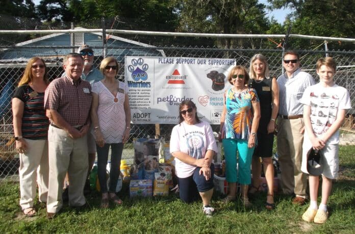 From left to right: Rotary Members Carol McElroy, Don McElroy, Mike Prescott, Mary Sports, PAW Warriors President Tracie Steger, Rotary members Judy Hughes, Silvia Dukes, Russ Jaeger, PAW Warriors volunteer Hagan Peters.