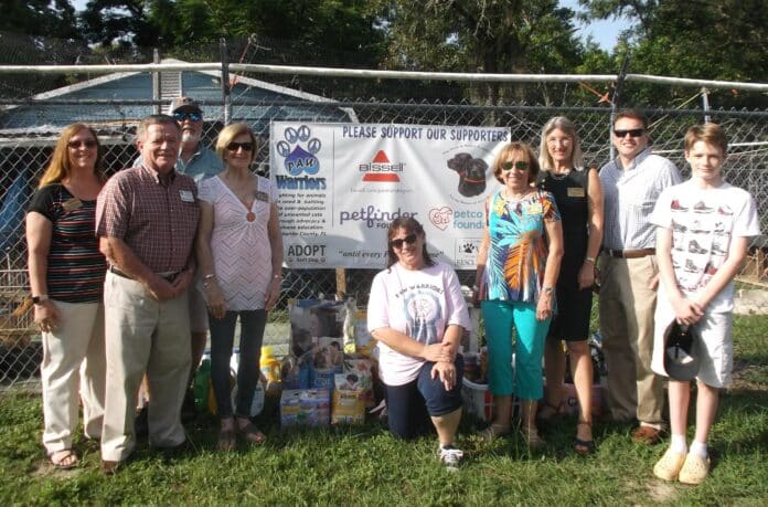 From left to right: Rotary Members Carol McElroy, Don McElroy, Mike Prescott, Mary Sports, PAW Warriors President Tracie Steger, Rotary members Judy Hughes, Silvia Dukes, Russ Jaeger, PAW Warriors volunteer Hagan Peters.  