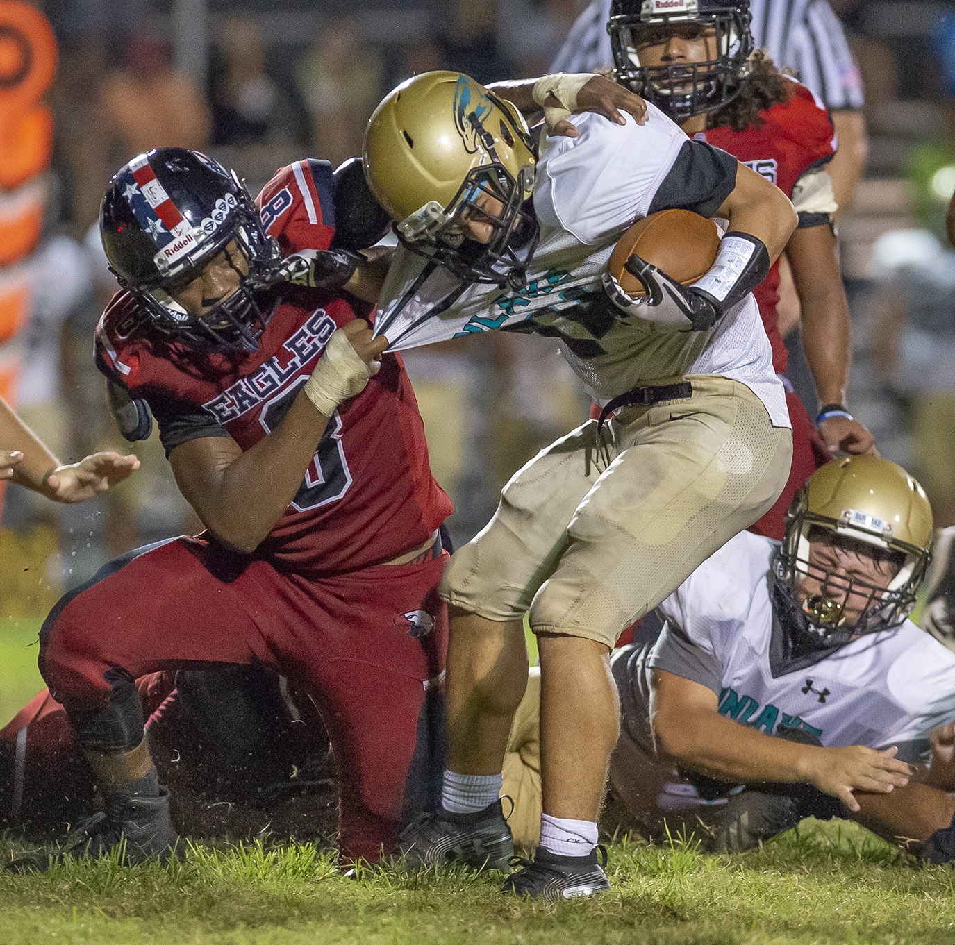 Springstead High’s ,8, Nicholas Billingsly corrals a Sunlake ball carrier in the Eagles home opener.  Photo by JOE DiCRISTOFALO