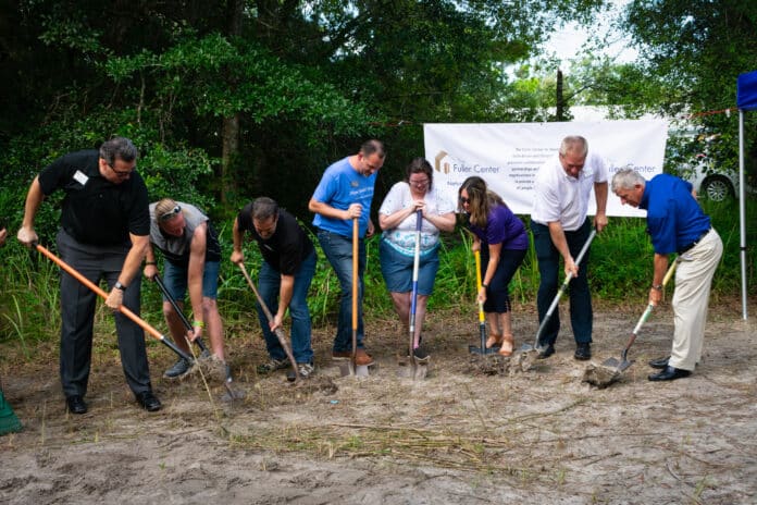 FCHNC Board of Directors with Nathan a ... eaking ground on construction site