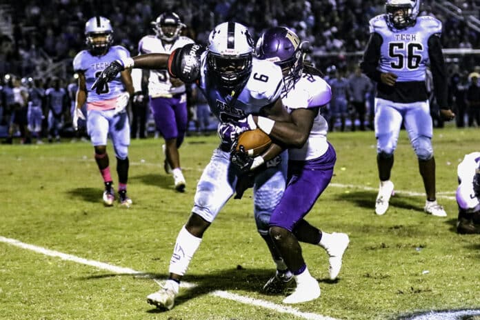 Hernando High's Kevon Williams tackles Sharks' Shemar Lawson during a game last year.