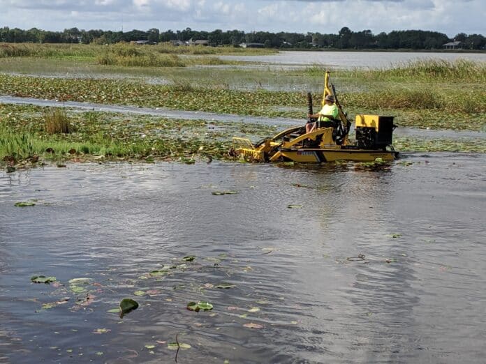 John Meeks of WaterzWay Work Boats systematically clears tussock that remained after 2017 clearing