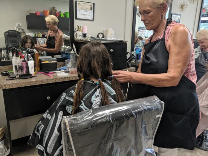 Julie Catherine Maglio donates to Locks of Love