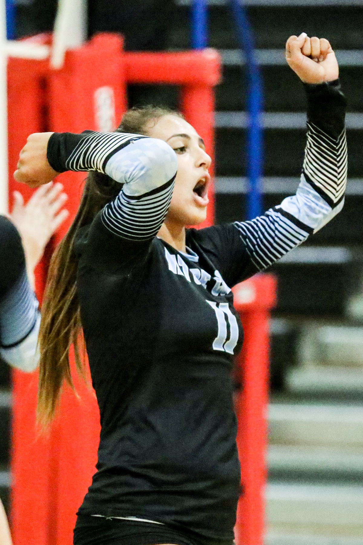 Tuesday night Aug. 20, 2019  Nature Coast #11 Senior Karla Cantero celebrates a  point against Hernando.