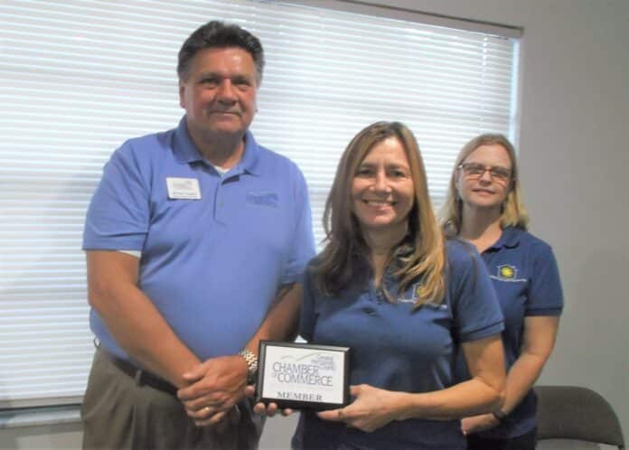 ABOVE: Michael Congeni from the Greater Hernando County Chamber of Commerce, Gloria West-Lawson, founder of Fostering Hope Florida and Becky Burton, manger of the Spring HIll Kidz Closet location.