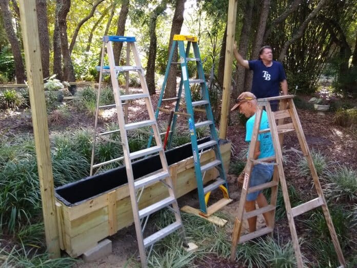 Assembling the water curtain at the botanical gardens.