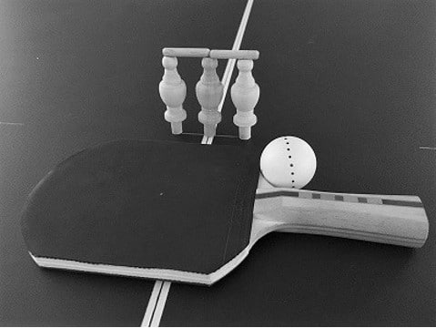 Ping Pong paddle and ball with wooden figures