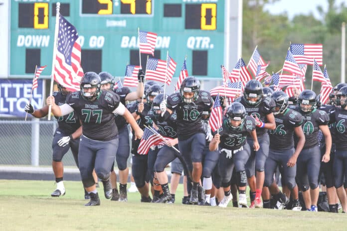 Weeki Wachee Hornets started the game with an American flag run along the sidelines before the game began. This game was honoring 9-11 first responders. Hornets Kolby Oudeans grandfather, John Lightsey, was one of the 9-11 dispatchers.