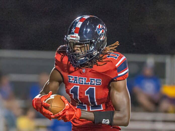 FILE PHOTO- Springstead High’s David Battle (11) gathers in a Max O’Rourke pass for a touchdown versus Crystal River. Photo by JOE DiCRISTOFALO