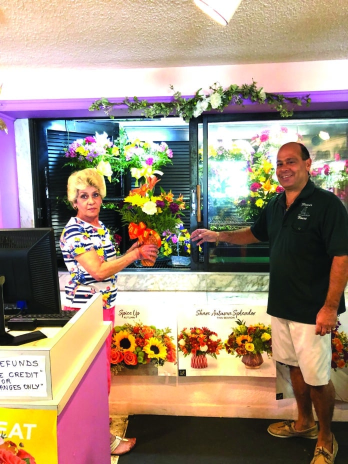 Albert Tavolaro, owner of The Flower Shop, with employee Ritsa Demetriou