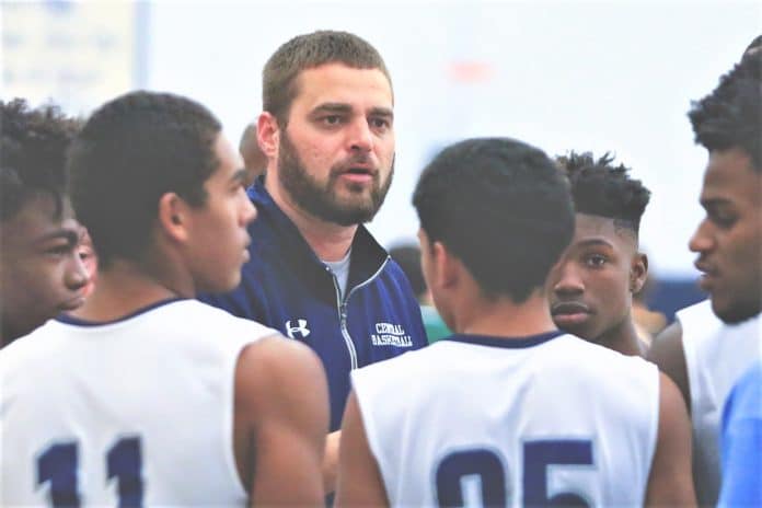 Central coach Matt Zendecki talks to his players during a time out Tuesday night during the Breakfast Station preseason classic at Central High School