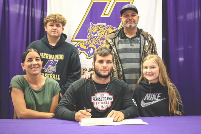  Connor Morgan along with this family at his signing event.