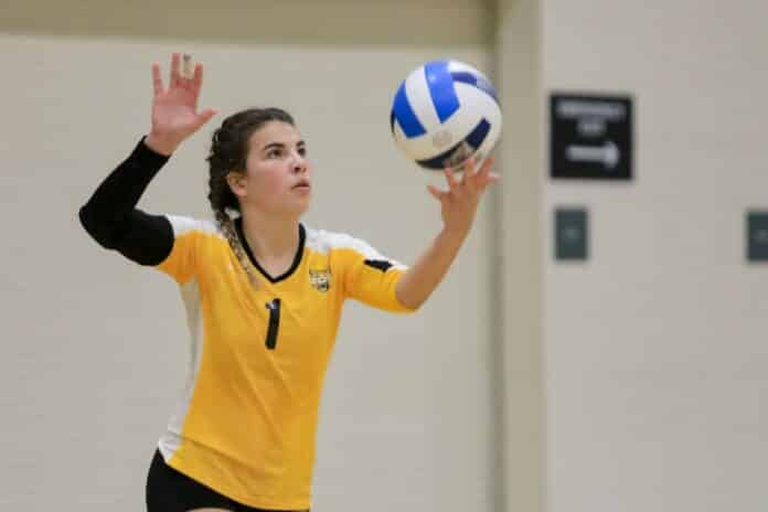 Setter Mary Lowe serves for PHSC during the match against Lake Sumter State College.