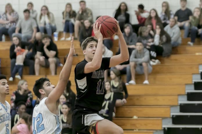 Hernando Jacob Batten (11) performs a layup during the game against Nature Coast Tech Friday night, December 6 at Hernando High. 